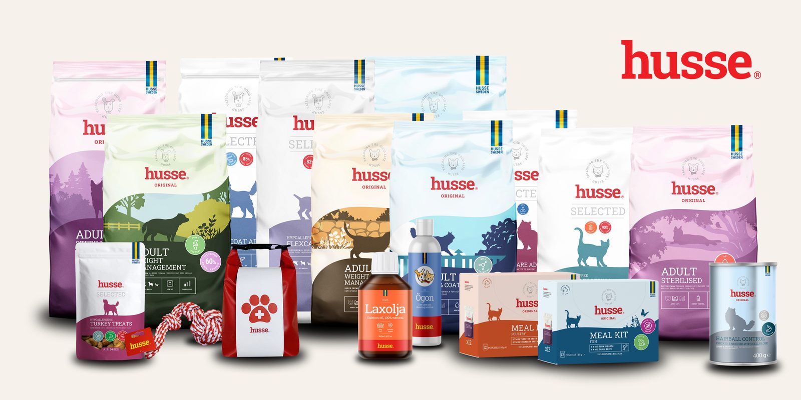 Gama de produse Husse: hrană uscată și umedă pentru câini și pisici, recompense, suplimente și accesorii